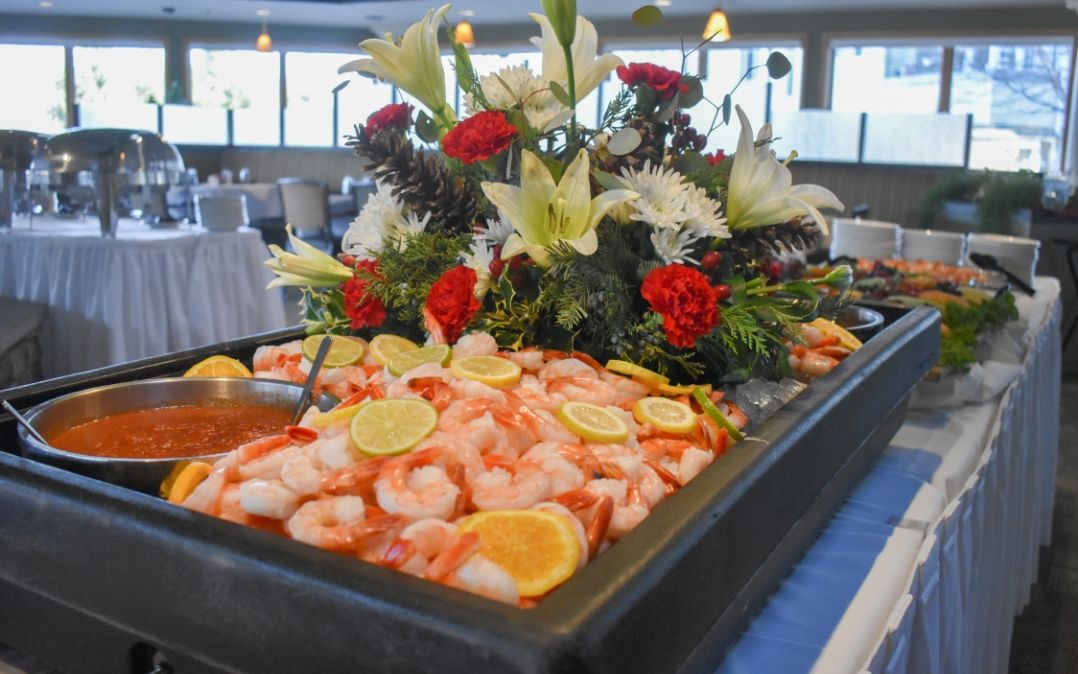 Chilled shrimp display at a Waters Edge buffet at Willow Brook Run in Delaware, Ohio — a special-event dining moment for senior residents and guests.